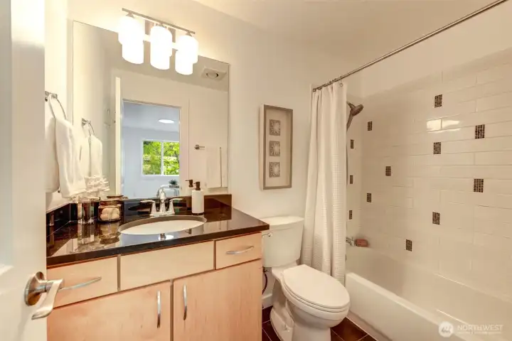 Full bath in primary bedroom.