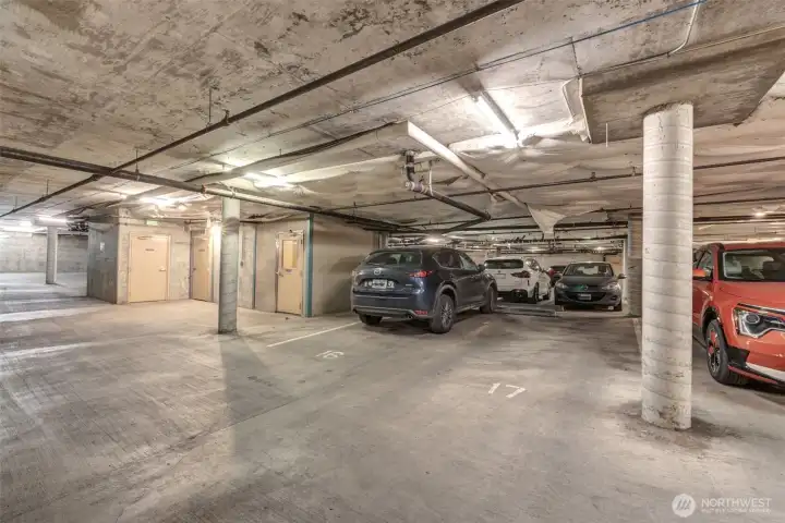 Secure common garage. Space # 17. Elevator access is conveniently located through the first door to the left, next to space 16.
