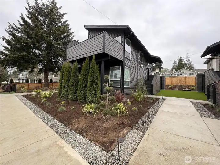 Completely landscaped with low maintenance turf and plantings. Completely landscaped with low maintenance turf and plantings.