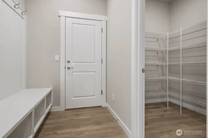 Convenient mudroom and pantry area. Photos are representative only and may display different color packages and/or upgrades. Convenient mudroom and pantry area. Photos are representative only and may display different color packages and/or upgrades.