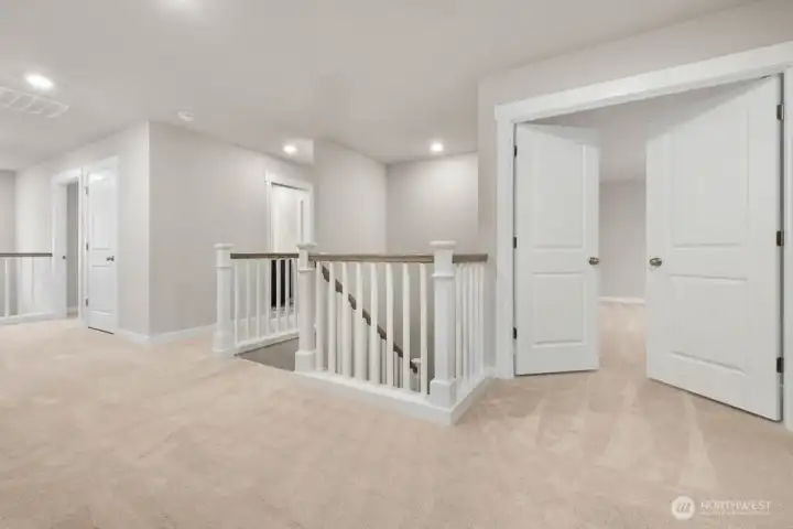 Spacious upstairs landing. Photos are representative only and may display different color packages and/or upgrades. Spacious upstairs landing. Photos are representative only and may display different color packages and/or upgrades.