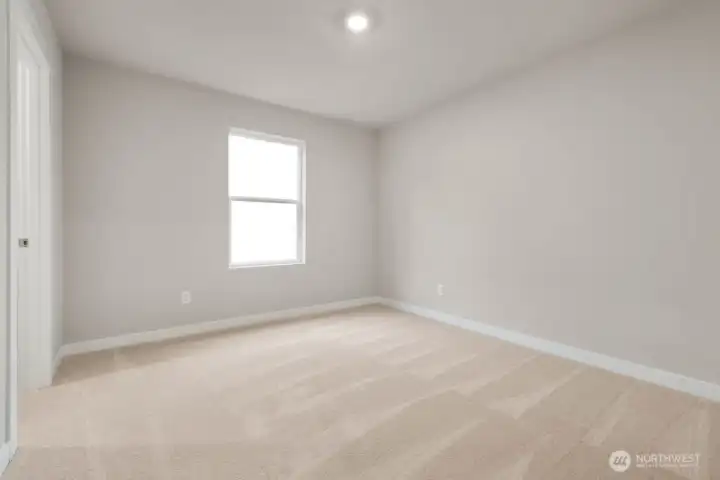 Spacious bedroom. Photos are representative only and may display different color packages and/or upgrades. Spacious bedroom. Photos are representative only and may display different color packages and/or upgrades.