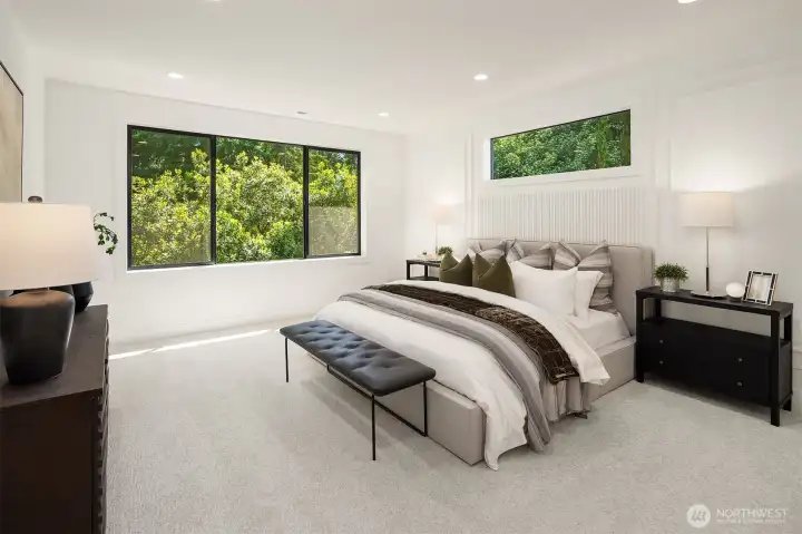 Designer primary suite with five-piece bath with heated floors