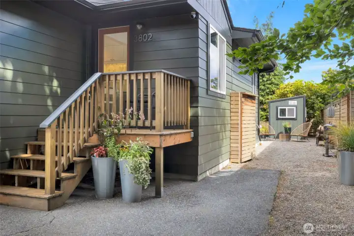 Double gates to backyard from driveway side home entry Double gates to backyard from driveway side home entry