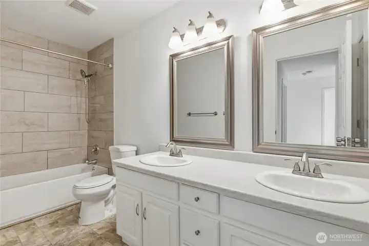 Upstairs jack-and-jill bathroom in main house.
