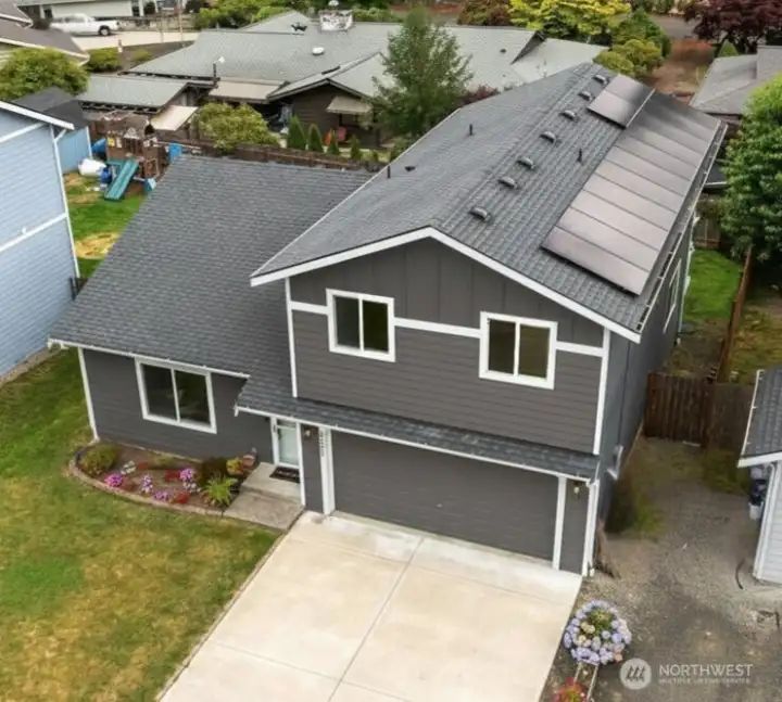 Enjoy the benefits of owned solar panels that help reduce monthly electric bills while adding lasting value to this beautifully maintained one-owner home.