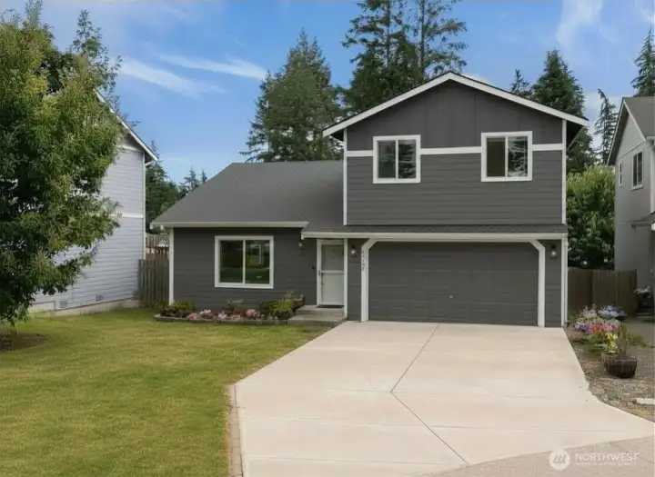 Beautifully maintained one-owner home featuring owned solar panels, newer exterior siding and paint (2024), and an two-car garage.