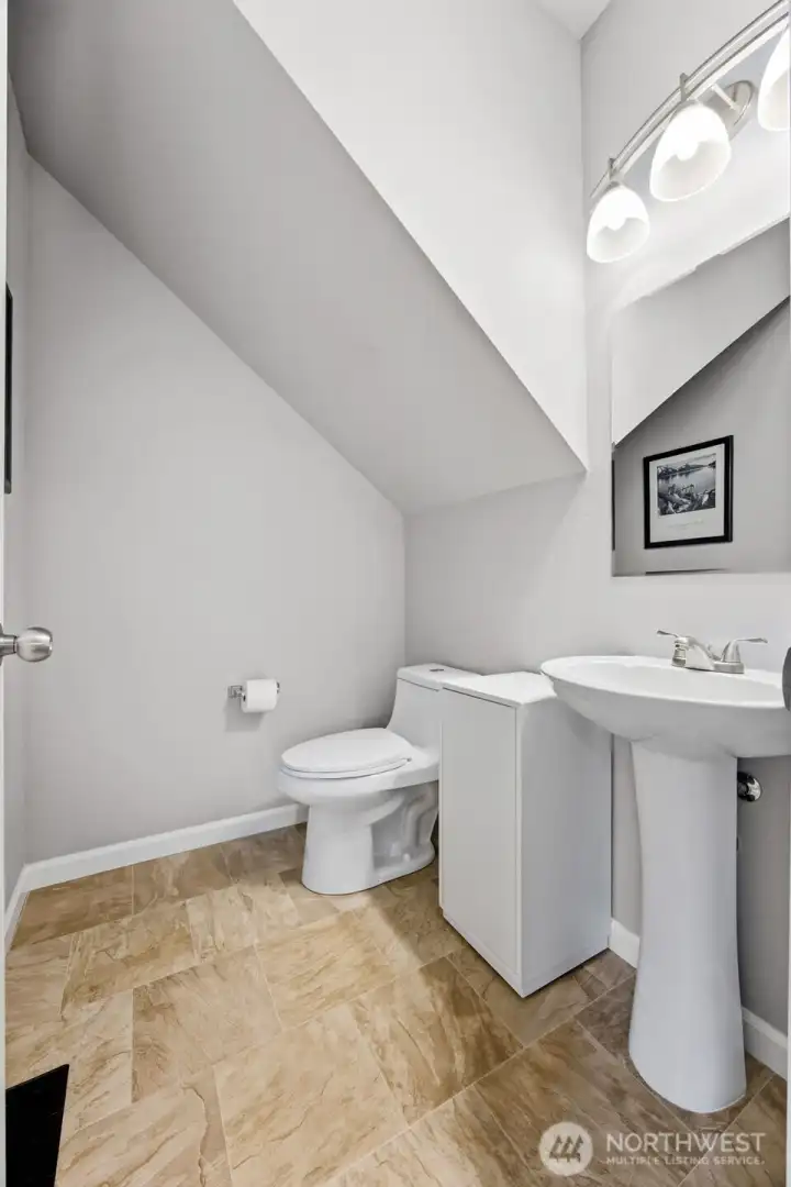 Convenient powder room on main level.