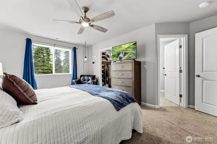 Your private retreat awaits with serene backyard views, a spacious layout, and direct access to the stunning custom-remodeled ensuite bathroom.