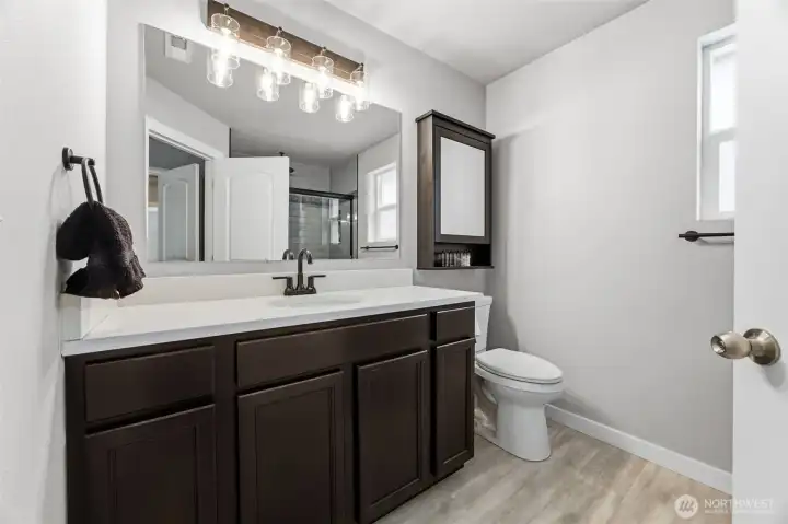 Custom-remodeled primary bath with upscale finishes, modern fixtures, and a luxurious design.