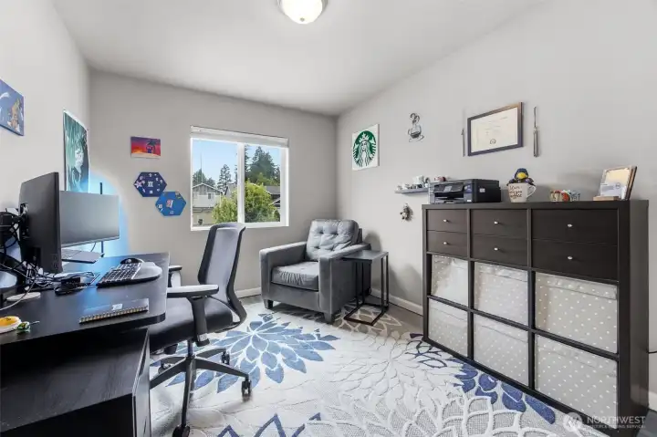 Additional bedroom offering versatility for guests, hobbies, or a home office.
