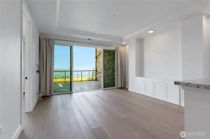 Living room with built in storage and designed to bring the outside in. Living room with built in storage and designed to bring the outside in.