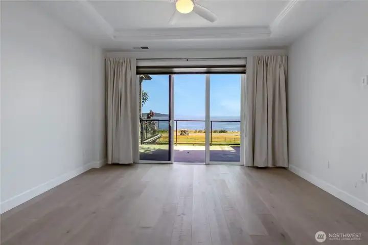 Large Primary bedroom with access to patio and that view Large Primary bedroom with access to patio and that view