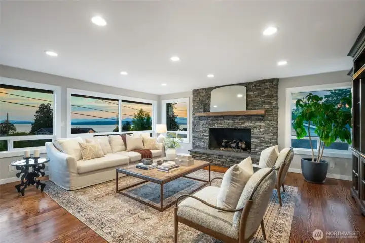 The perfect sunset from the open floorpan living room with large windows. The perfect sunset from the open floorpan living room with large windows.