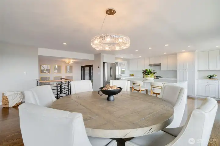 Large open dining to kitchen and living spaces. Large open dining to kitchen and living spaces.