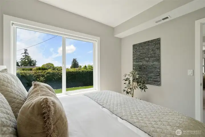 Guest suite downstairs with a view and ample light. Guest suite downstairs with a view and ample light.