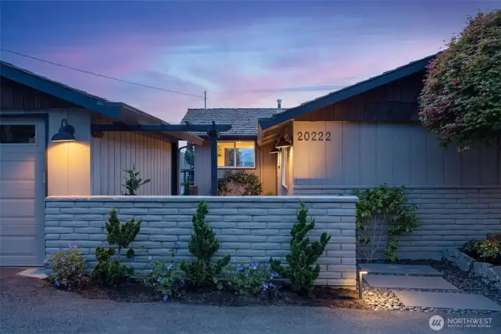 Entrance of the home with the garage on the left and home on the right. Entrance of the home with the garage on the left and home on the right.