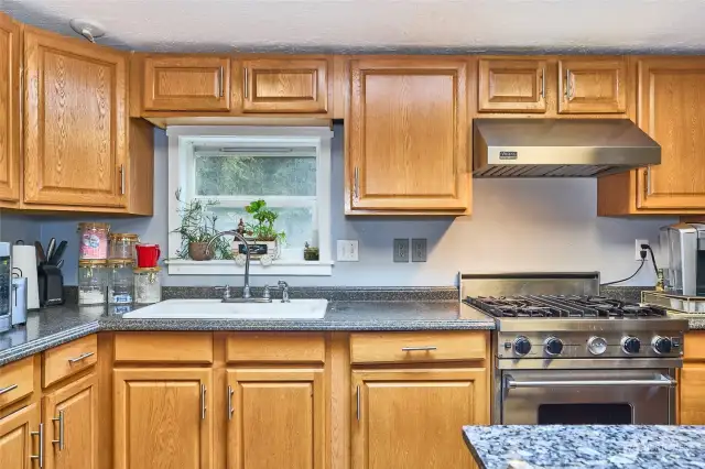 Kitchen with Viking gas range.