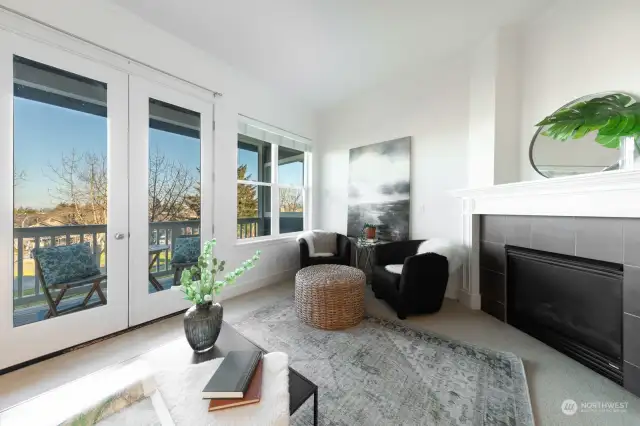 Wonderful sunny living room with gas fireplace.