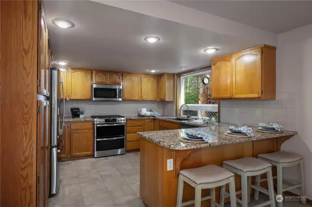 Stone and Stainless Kitchen.