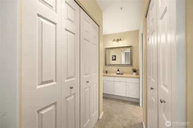 Walk-through double closets into the ensuite bathroom