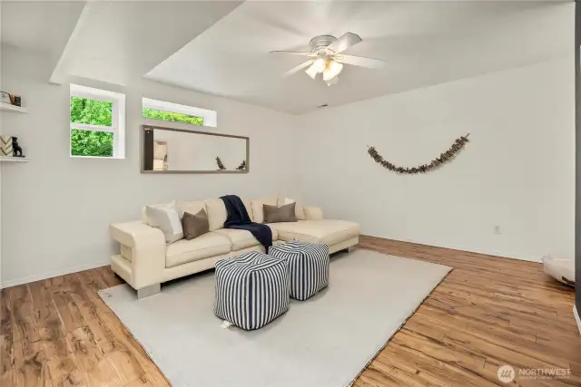 Large downstairs space has so many options! Could be a family room or separate living space.