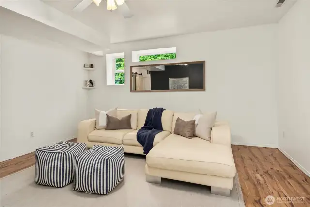 Large downstairs space has so many options! Could be a family room or separate living space.