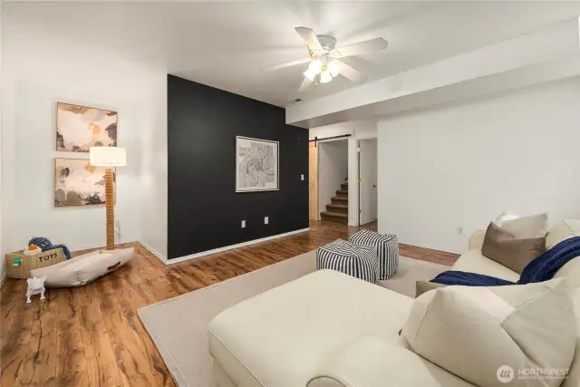 Downstairs family room off of downstairs bedroom. Also has separate nook that could make a great storage or desk/workspace area.