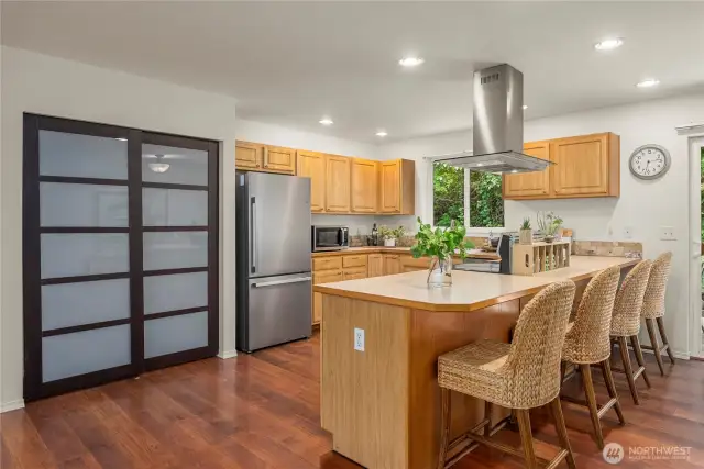 Good sized pantry with updated pantry doors, brand new fridge and stainless appliances throughout.