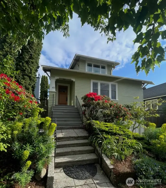Beautiful classic home with newer exterior paint. Great off street parking with extra deep garage with huge shop and 2 car driveway.