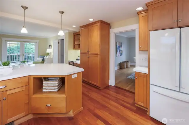 Bright and sunny kitchen with new quartz countertops, backsplash and range.