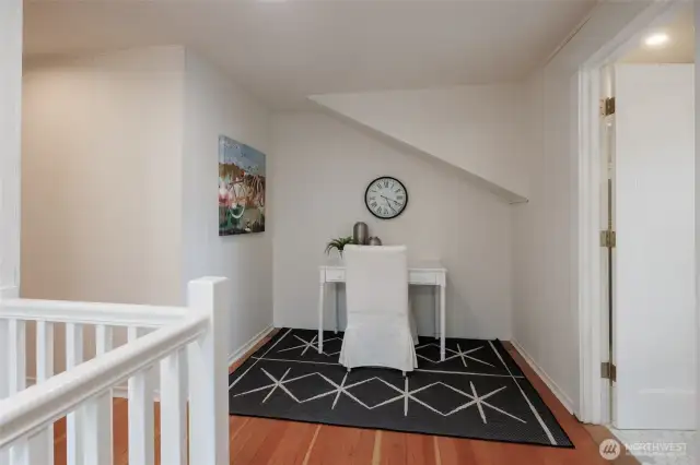 Upstairs landing makes a perfect spot for a reading nook.
