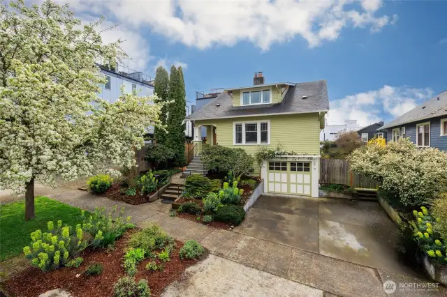 Beautiful classic home with newer exterior paint. Great off street parking with extra deep garage with huge shop and 2 car driveway.