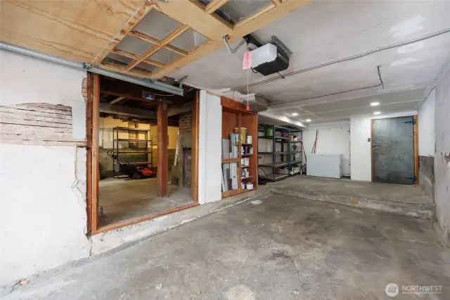 Extra long garage with huge attached workshop.