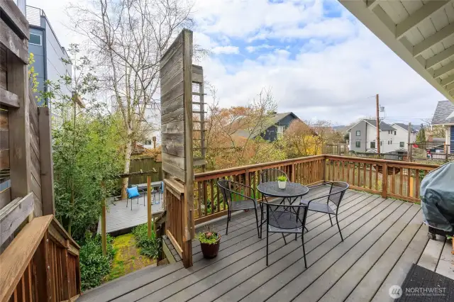 Amazing fully fenced backyard with garden space and multi-level deck.