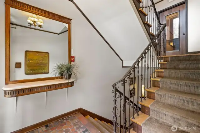 Wrought iron railing staircase.