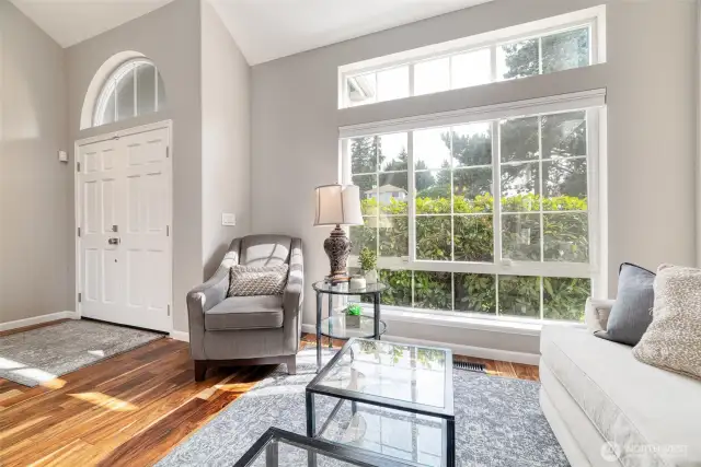 Natural light pours into the formal living room