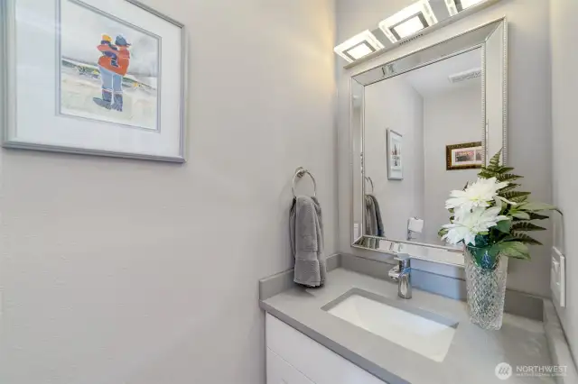 Modern, updated first-floor powder bathroom