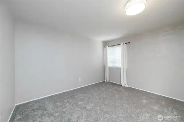 Second, upper-floor guest bedroom