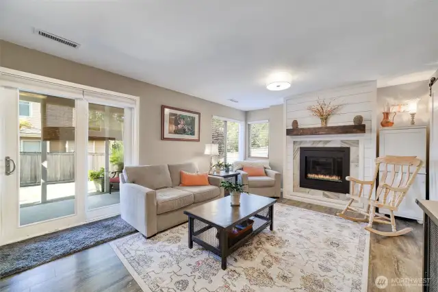 Elegant lower-level rec room offers warm, versatile living space—ideal for a media room, guest suite, or home office. With a full bath and bedroom, it also presents excellent income or multigenerational potential