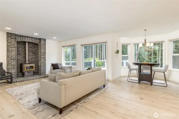 Open concept family room flows into the breakfast nook and kitchen, or step out to the back deck