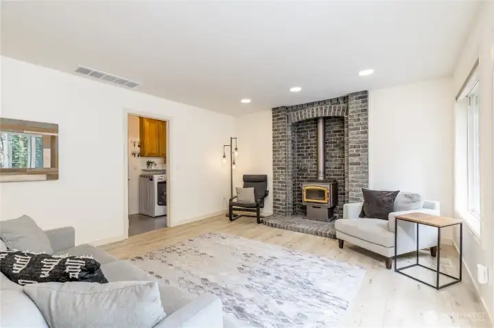 Laundry room and garage access are conveniently positioned off the family room