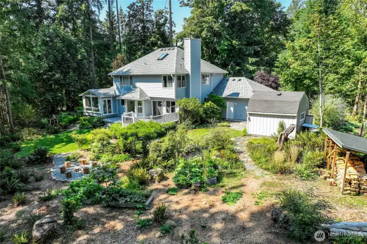 Your corner of paradise includes a serene back yard with a sunny garden