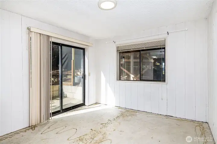 Lower level bonus room just off the family room with slider to south side.