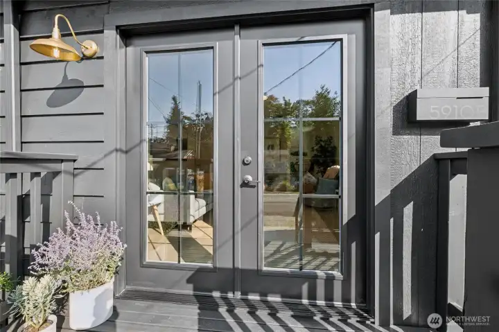 Totally separate porch for the MIL, right off the driveway.