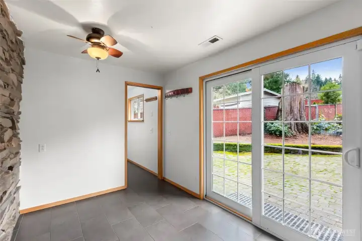 Enjoy a well-appointed utility room just steps from the kitchen, perfect for laundry, cleaning and household organization with convenience in mind