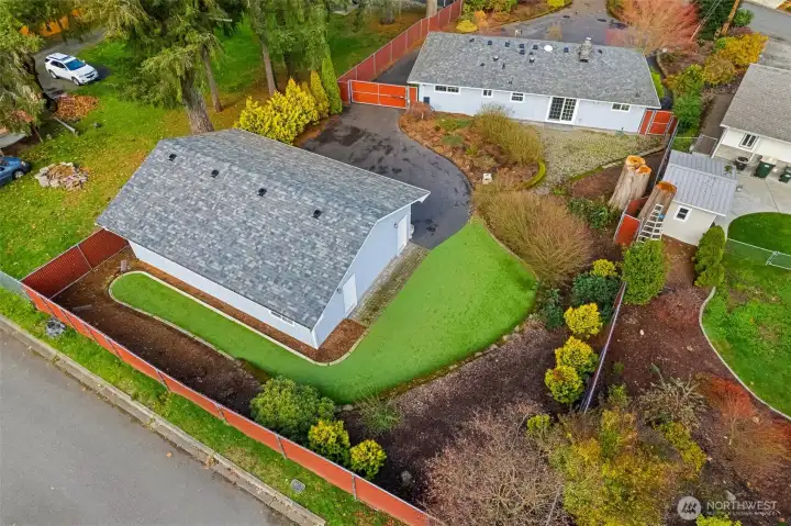 Birds Eye view of the 15,349 square-foot lot , emphasizing generous yard space, landscaping possibilities, and outdoor living potential