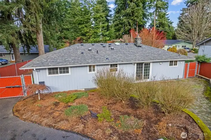 Generous dirt area ideal for gardening, perfect for cultivating plants, or designing a lush outdoor retreat