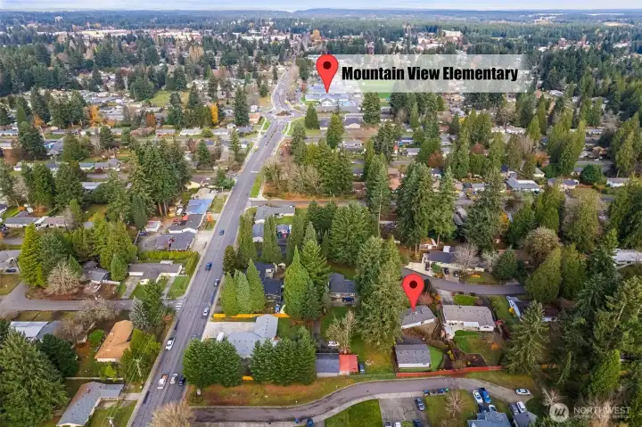 Situated only four blocks away from Mountain View Elementary school, perfect for families seeking convenience, community and excellent school access