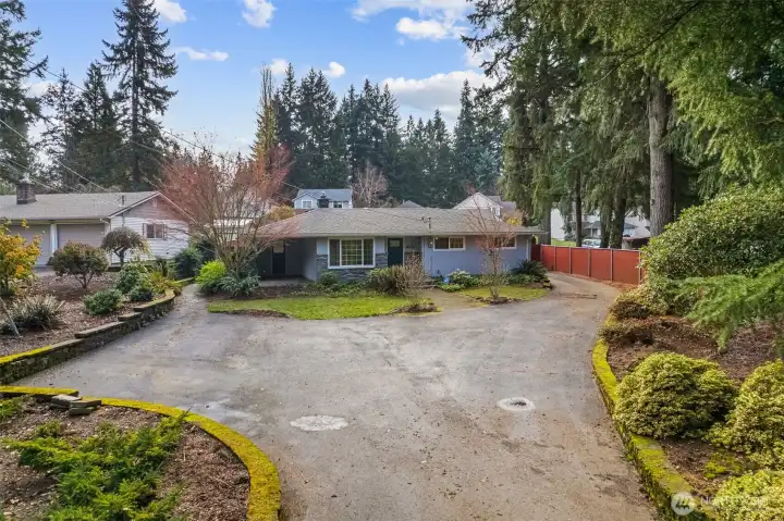 Extended driveway offering generous parking space, ideal for multiple vehicles or guest parking and effortless vehicle access